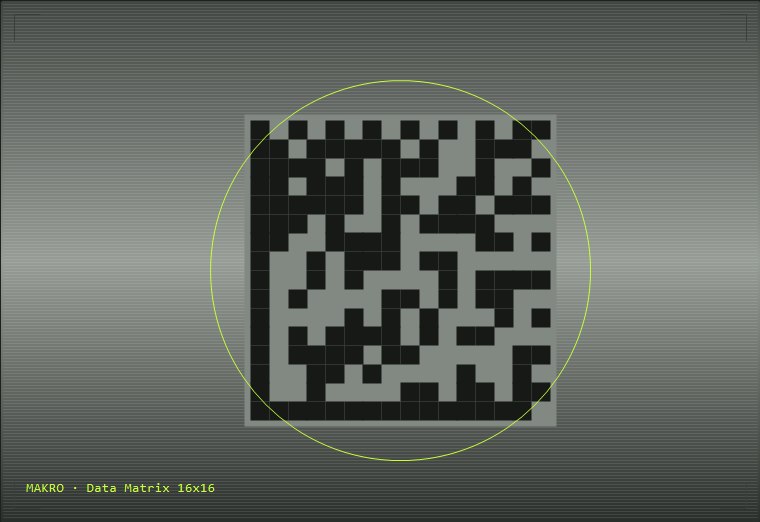 Metal yüzeye kazınmış Data Matrix kodunun makro görüntüsü